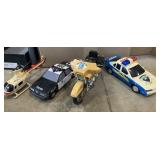 Toy police vehicles and mat