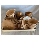 Tan plastic dinnerware