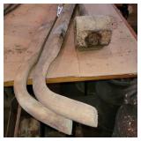 Wheelbarrow handles and hammer