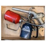 Oil cans, gas pump handle
