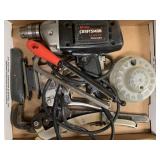 Drill, pipe wrench, knife, and more