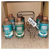 Vintage Texaco cans in holder/carrier