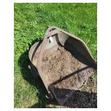 Metal scoop implement