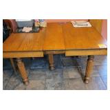 Antique wooden table w/ leaves (no contents)