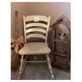 Small wooden rocking chair, broom and decor