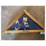 US flag , medal, dog tag and photo in case