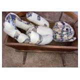 Quilted bear in wooden cradle