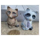 (2) concrete raccoons