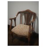 Carved Parlor Chair on Casters
