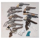 Collection of 12 cap guns & Grips AS IS