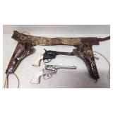 Vintage set of Fanner 50 cap guns and holster