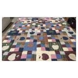 Vintage pieced and apple qppliqued quilt