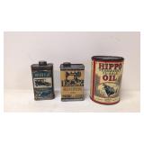 Three Vintage metal advertising cans