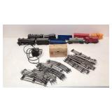 2 trains with track & transformers