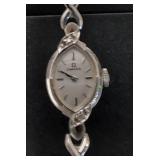 14 k white gold Bezel Omega ladies watch with diam