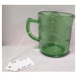 Cream Dove Brand Peanut Butter Green measurer cup