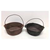 two 10' cast iron pots
