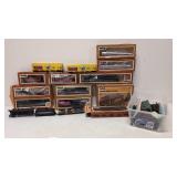 14pcs. Tyco Train cars plus box of track