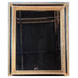 Large ornate framed bevel mirror