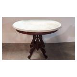 1800s Victorian oval mahogany marble top table