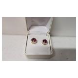Round Cut Ruby and White Topaz earrings