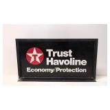 Texaco painted metal sign in metal holder