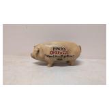 Finck's Overalls cast iron pig bank