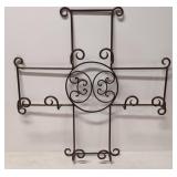 Ornate metal wall hanging book or plate rack