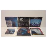 6 Rock albums in plastic sleeves