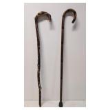 2 wooden walking sticks