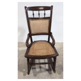 Antique laced cane sewing rocker