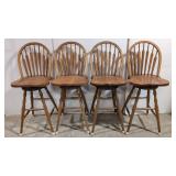 Four oak 30' arrow back bar stools