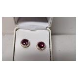 Round cut ruby and white topaz earrings