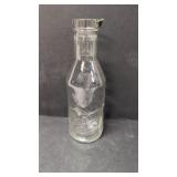 Absolutely pure milk bottle with spout