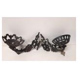 Two cast iron oil lamp holders