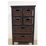 Black wood cabinet with natural wicker drawers