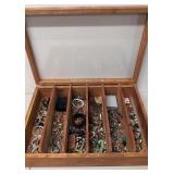 Display case full of costume jewelry