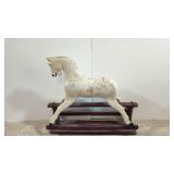 Antique wooden glider horse
