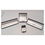 4 pcs. Gold toned Cubic Zirconia jewelry