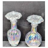 Two iridescent perfume bottles