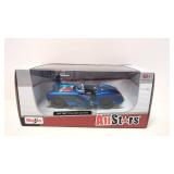 1957 Blue Chevrolet Cosrvette in box
