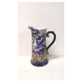 Hand painted porcelain pitcher
