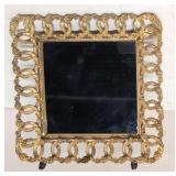 Ornate Brass laced framed mirror