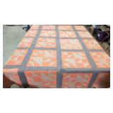 Antique orange and gray Stargrove pattern quilt