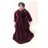 Porcelain Doll on wood stand