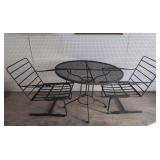 Wrought Iron Table & Two Spring Rocker chairs