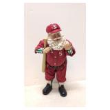 Santa Figurine Autographing a baseball
