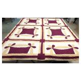 Antique Burgundy and gold pieced quilt