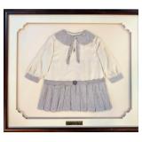 Antique Child's dress framed under glass
