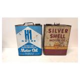 Two 2 gallon motor oil cans